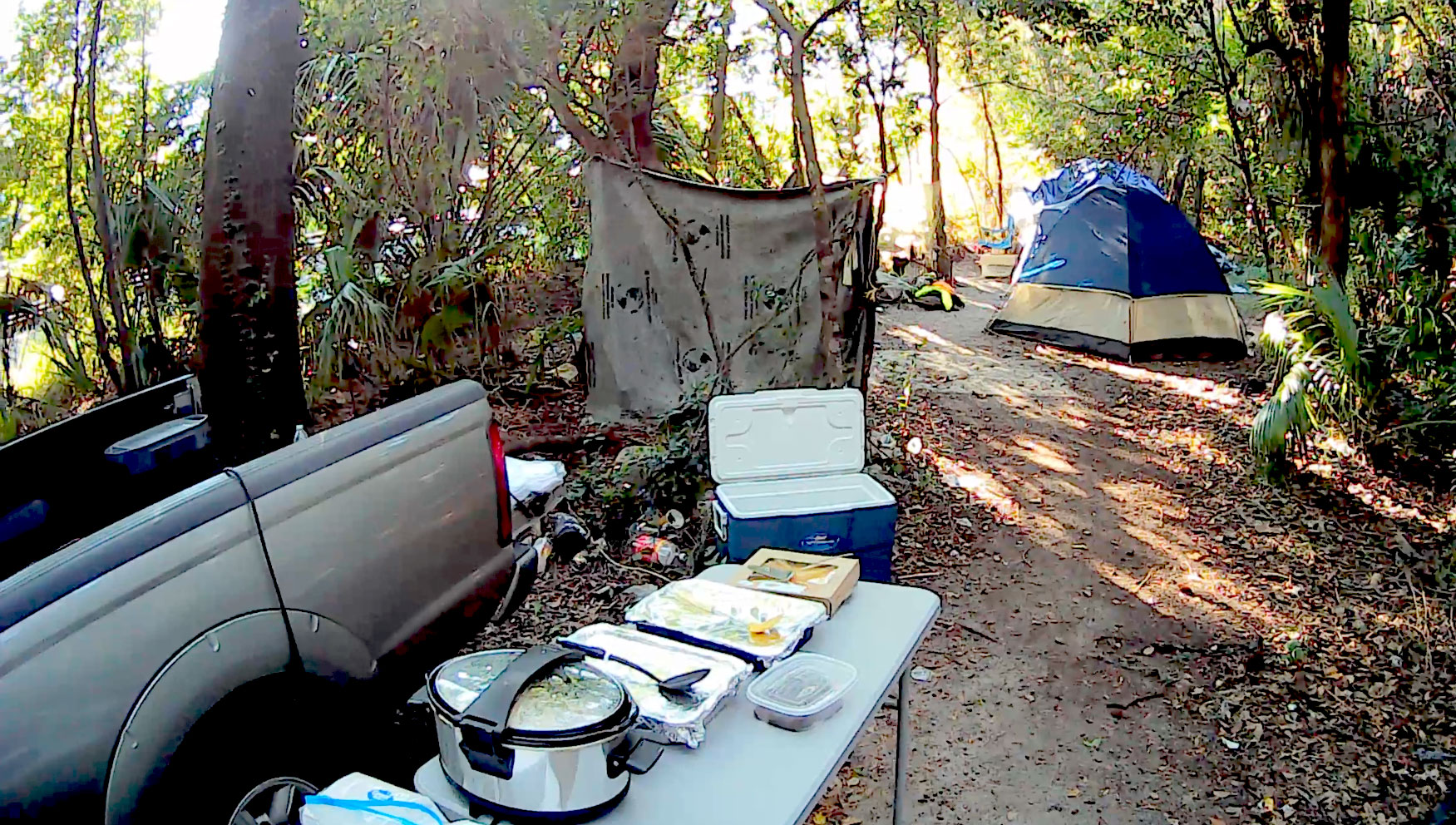 Volunteers serving a Thanksgiving meal at the homeless camp